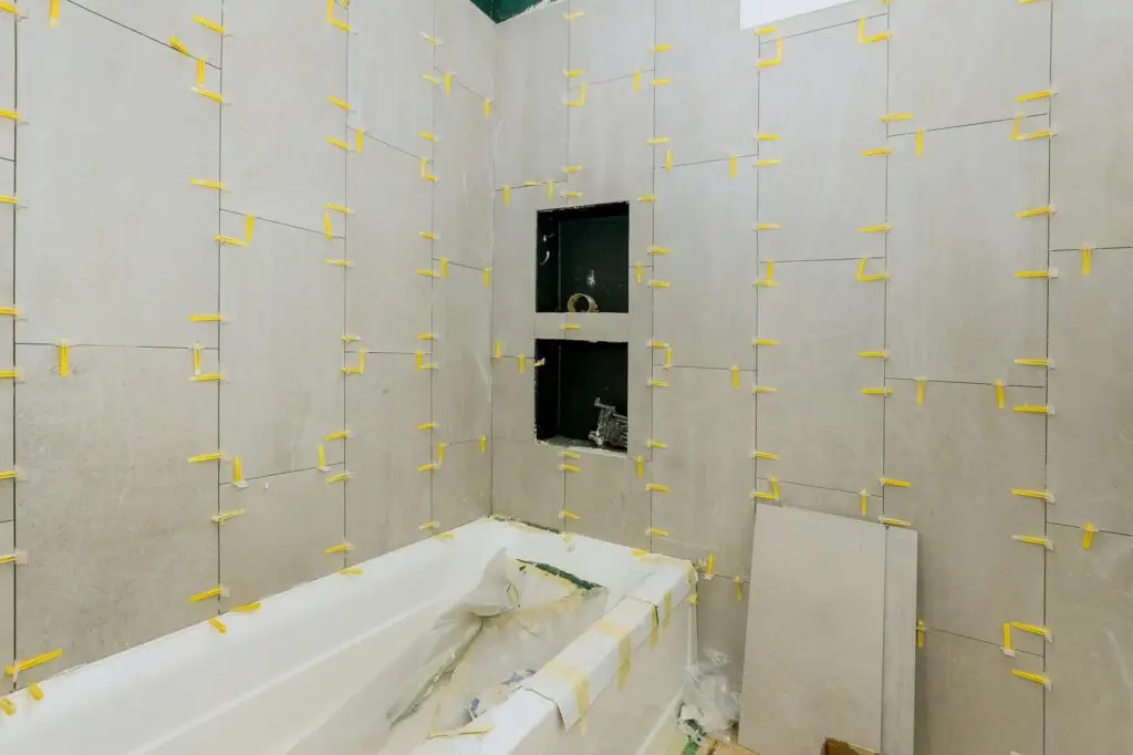 tiler in Dublin Laying tiles in the bathroom construction floor and wall ceramic tiles installation unfinished